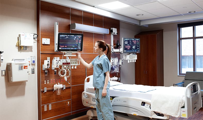 Download image (.jpg) (opens in a new window) Two doctors reviewing mammogram case